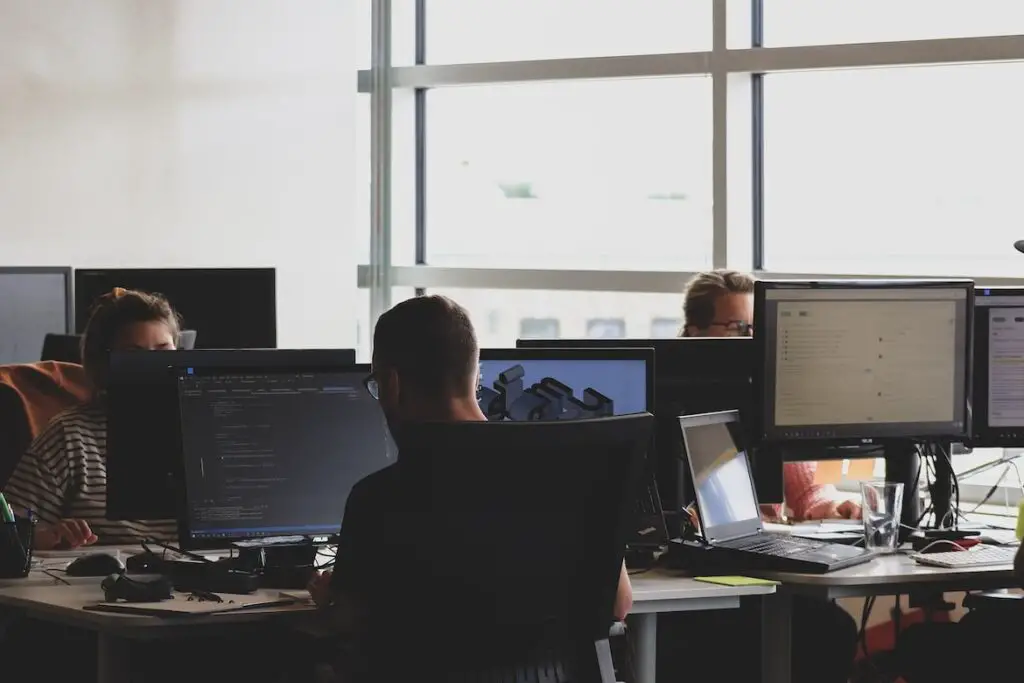 Office With Computers And Peoples