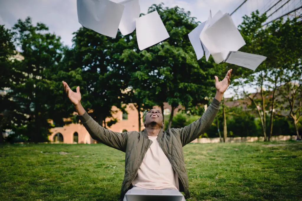 Student Throwing Papers
